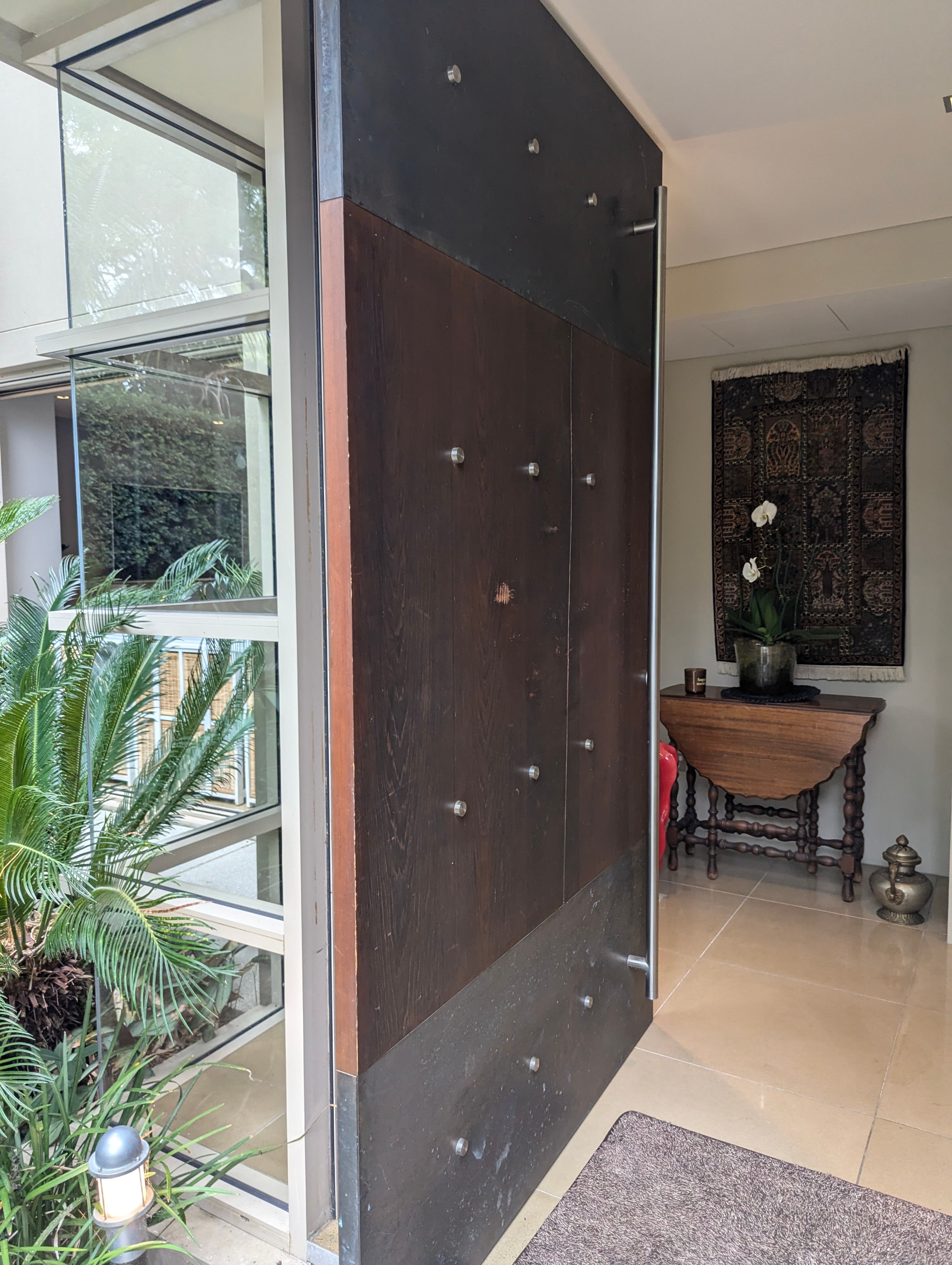 Calm architectural interior — warm natural light and refined materials